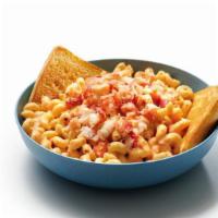 Fiery Lobster Pasta · Get heated for our tender pasta tossed in a spicy red-pepper Alfredo tomato sauce and heaped...