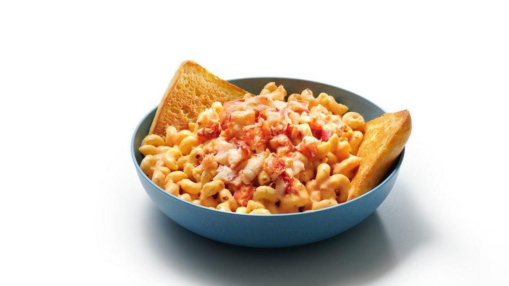 Fiery Lobster Pasta · Get heated for our tender pasta tossed in a spicy red-pepper Alfredo tomato sauce and heaped with hand-cut lobster meat. Served with ciabatta toast for dipping