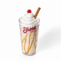 New! Barking Pretzel Fribble! · Caramel drizzle meets extra thick milkshake made with brown sugar flavored ice cream, swirle...