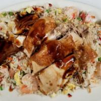 House Special White Fried Rice Lamb · Includes Chicken, Shrimp, Lamb, and Crab Meat.