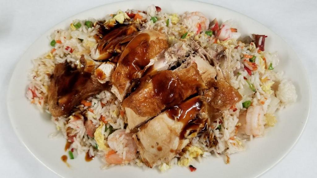 House Special White Fried Rice Pork · Includes Chicken, Shrimp, Pork, and Crab Meat.
