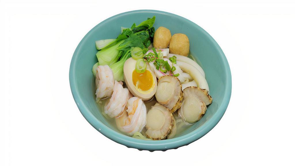 Seafood Ramen · Japanese ramen with shrimps, scallops, squid slices, fish balls, naruto fish cakes, bok choy and soft boiled egg.