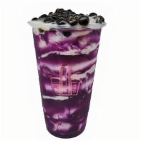 Ube Swirl Bubble Milk · Purple yam with milk and tapioca boba. Available in Large only.