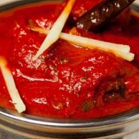 Lamb Vindaloo · Very spicy. Vindaloo is a Portuguese influence on Indian cuisine, vin, and alho meaning vine...