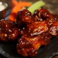 Classic Bbq · 8 BBQ wings (mild heat), served with carrots & celery and a choice of blue cheese, classic r...