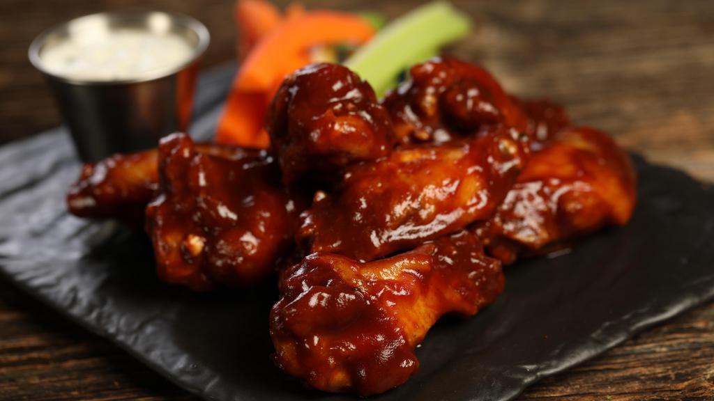 Classic Bbq · 8 BBQ wings (mild heat), served with carrots & celery and a choice of blue cheese, classic ranch, or Sriracha ranch for dipping
