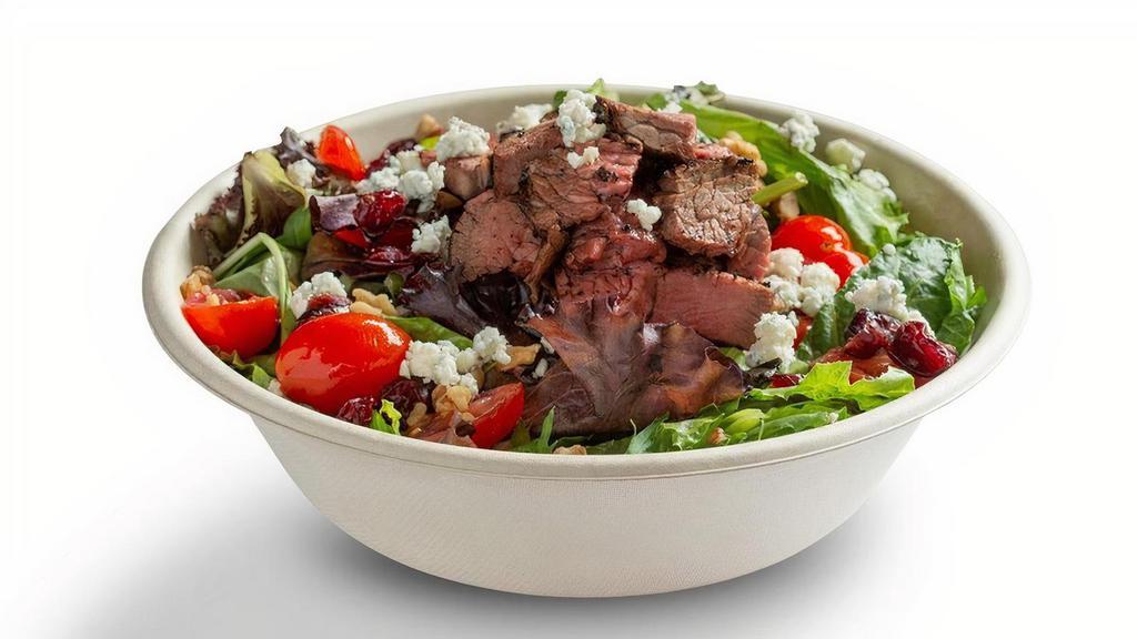 Steak Bacon & Bleu · Grass-fed tri tip steak, chopped romaine & mesclun mix, bacon, cranberries, walnuts, tomatoes, gorgonzola bleu cheese. (dairy, soy, tree nuts). Suggested with cranberry vinaigrette.