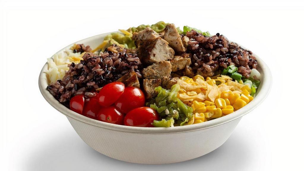 Southwest Grilled Chicken · Grilled chicken, purple rice blend, chopped romaine, avocado, pickled jalapenos, tomatoes, black beans, scallions, corn, shredded white cheddar, tortilla strips. (dairy). Suggested with lime cilantro jalapeno dressing.