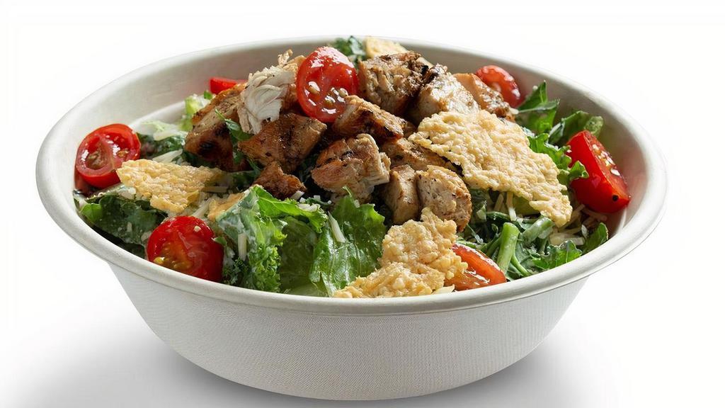 Kale Caesar Chicken · Grilled chicken, shredded kale & chopped romaine, parmesan crisp, tomatoes, shaved parmesan. (dairy) . Suggested with Caesar dressing. (egg, fish, dairy, soy)