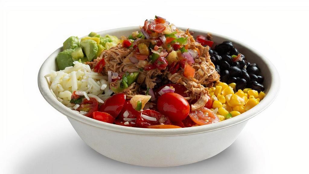 Tinga Taco Bowl · Chicken tinga, purple rice, black beans, roasted peppers & onions,  tomatoes, street corn, mexican crema, avocado, pineapple pico, white cheddar, chicken tinga, tortilla strips, green or red salsa. (egg, dairy)