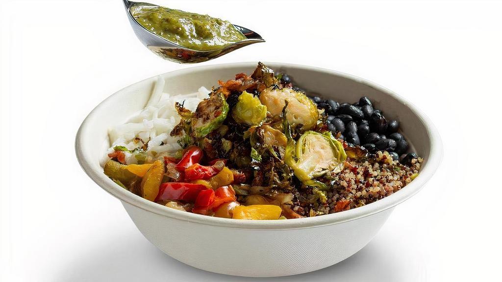 Maple Bacon Brussels Bowl · Purple rice, quinoa, black beans, roasted peppers & onions, jicama, green salsa.  Maple drizzle.