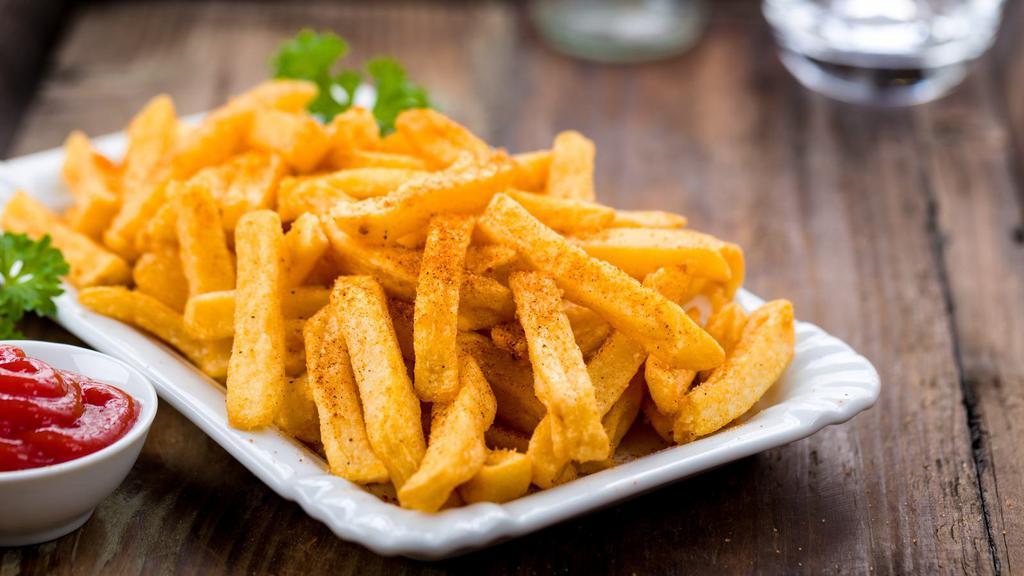 French Fries · Hearty hand cut golden French fries.