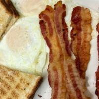Two Eggs &  Bacon · Two Eggs, 4 Bacon strips,Toast and jelly.