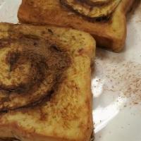 Cinnamon Bread French Toast · 3 slices of thick cinnamon swirl toast dipped in egg batter