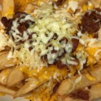 Loaded Fries · Mozzarella and Cheddar, bacon, ranch.