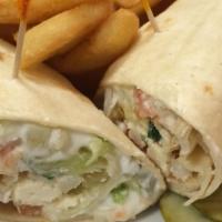 Chicken Ranch Wrap · Breaded chicken tenders stuffed with lettuce, tomato, cheddar cheese and tossed in a ranch d...