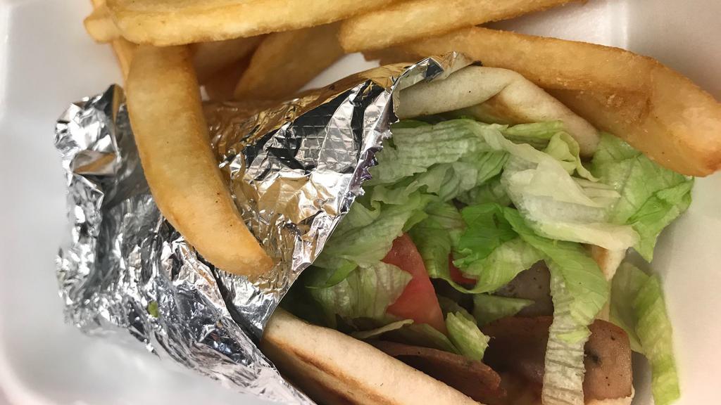 Gyro Sandwich On Pita · With steak fries.