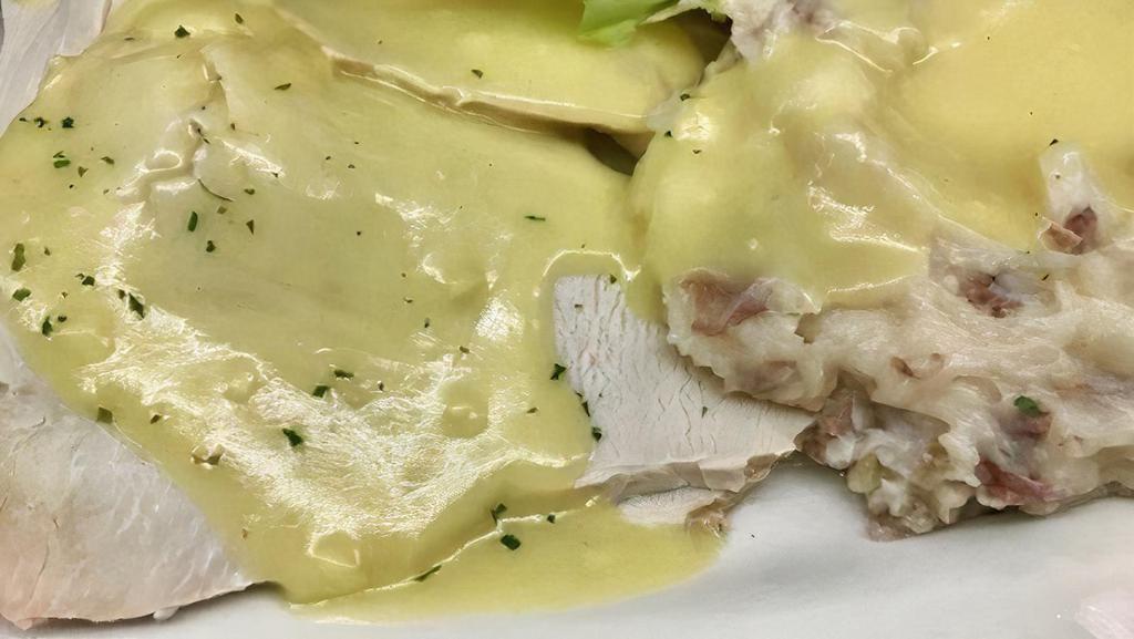 Turkey Dinner · Freshly in house Roasted turkey breast offered with stuffing and cranberry sauce.