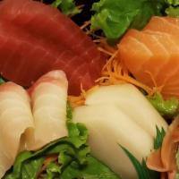 Sashimi Appetizer · Seven pieces of assorted sliced sashimi.