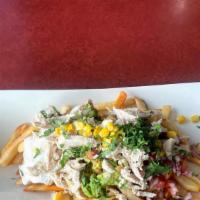 Mexican Fries · 400 grs french fries, sour cream, pico de gallo, guacamole, shredded chicken.