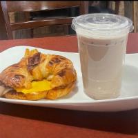Coffee Time · Bacon, egg, cheese, strawberry jelly in a croissant and 16 oz milo (cold or hot, your choice)