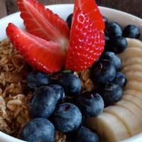Parfait · Greek yogurt,  granola, strawberries,  blueberries.
