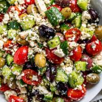 Greek Salad · Romaine lettuce, tomato, cucumbers,  and olive oil.
