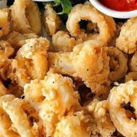 Fried Calamari · Served with our special sauce.