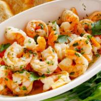 Shrimp Casserole · Jumbo shrimp sautéed with creamy sauce and vegetables.