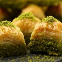 Baklava · Layers of filo filled with chopped nuts served with syrup.