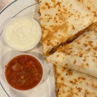 Cheese Quesadilla · Mixed Cheese, Onion, Tomatoes and Peppers.