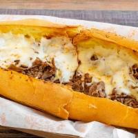 Ribeye Cheese Steak Sub · Thinly sliced Ribeye steak with cheese, served with choice of grilled onions, peppers and mu...