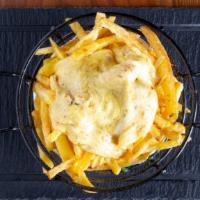 Cheese Fries · Golden crisp french fries with melty cheese.