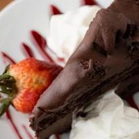 Chocolate Cake · Doubled layered chocolate cake w/ whipped cream & chocolate sauce