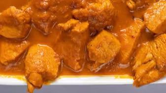 Chicken Curry · Chicken in curry sauce with traditional spices.