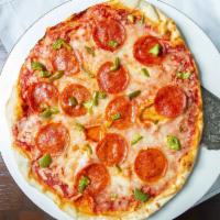 Personal Pizza Ala Clino · Fresh mozzarella, sun-dried tomato, pesto, and tomato sauce.