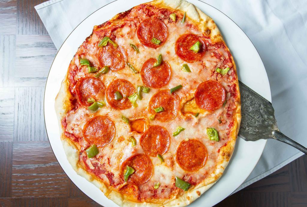 Personal Pizza Ala Clino · Fresh mozzarella, sun-dried tomato, pesto, and tomato sauce.