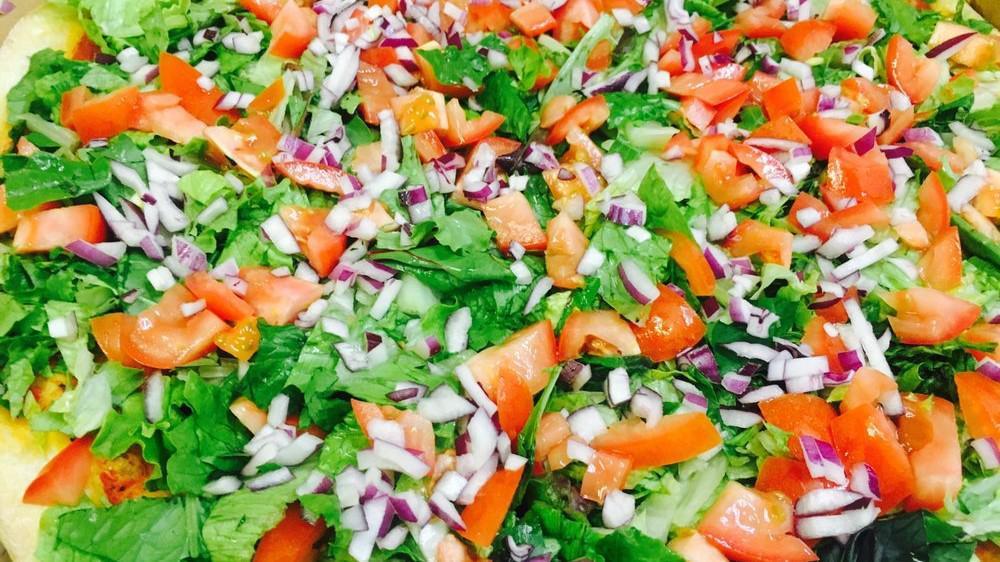 Salad Pizza · Lettuce, tomatoes, and onion (sauce based).