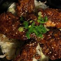 Garlic Chicken Wings · Sweet and spicy fried chicken wings with fresh minced garlic sauce kicker.
