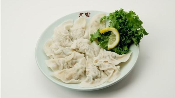 Mool Man Doo  · Boiled dumplings made with pork and vegetable