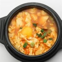 Soon Doo Boo Chi Gae · Spicy. Soft bean curd stew with egg in spicy sauce.
Choice of Seafood/Beef/Pork/Chicken/Kimc...