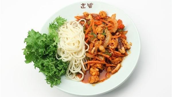 Ojing Uh Bokum · Spicy. Sauteed squid with vegetables in spicy sauce.
