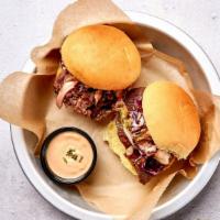 Two Bulgogi Ribeye Sliders · Two of our thinly sliced soy marinated USDA Choice ribeye beef in a bulgogi marinade with a ...