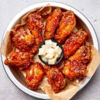 Sweet Thai Chili Wings · Bell & Evans wings fried in our special olive oil blend and painted with our umami soy garli...