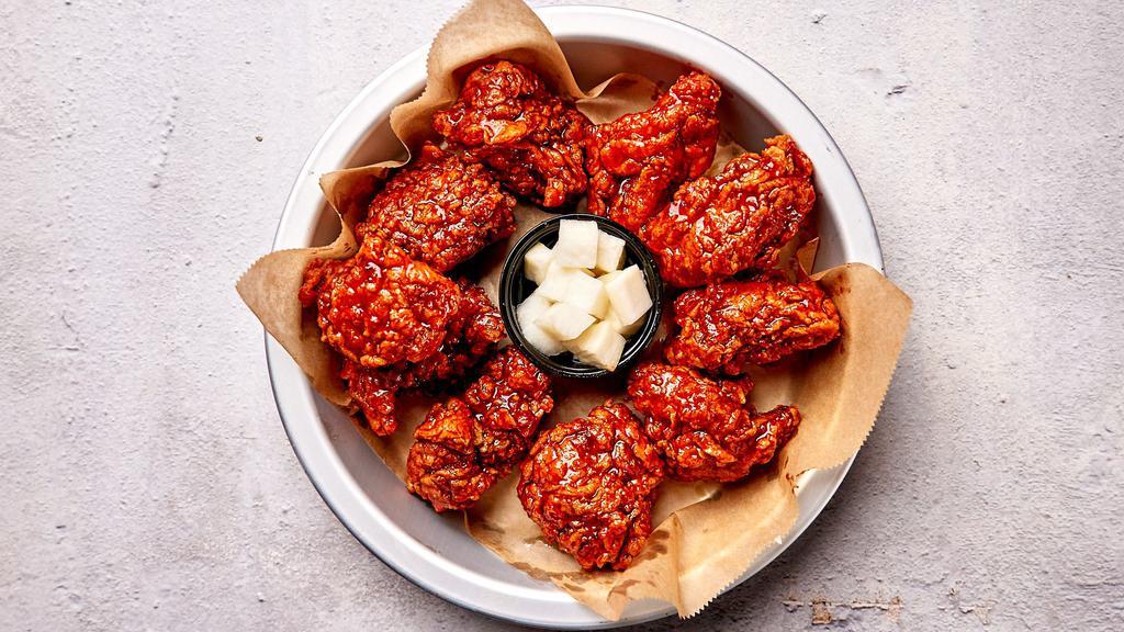 Chili Gochujang Boneless Wings · Bell & Evans boneless chicken fried in our special olive oil blend and painted with our umami soy garlic sauce.
