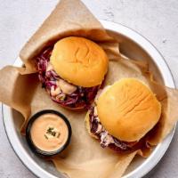Two Mango Haberno Fish Sliders · Two hand battered spicy Montauk fish filets built with a kimchi slaw, pickled cucumbers and ...