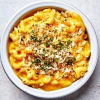 Brown Butter Mac & Cheese · Macaroni prepared with a housemade cheese sauce, beurre noisette, and bread crumbs.