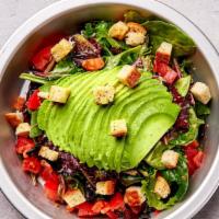 Avocado Caesar Salad · Spring mix salad with crunchy garlic croutons, avocado, tomatoes, and homemade caesar dressi...