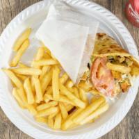 Chicken Gyro With Fries And Free Can Soda  · On a pita bread.
