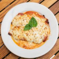 Pollo Parmigiana · Chicken Cutlet, Tomato Sauce, Homemade Mozzarella, Parmigiano Reggiano